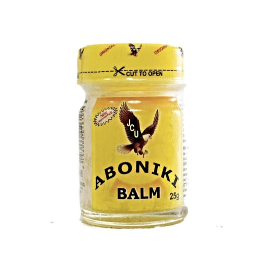 Jar of Aboniki Balm with yellow lid and label on a white background