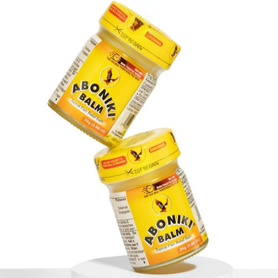 Two jars of Aboniki Balm on a white background
